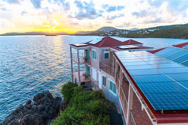 Lush tropical gardens surrounding Ocean Pointe Caribe private villa near Secret Harbor, St Thomas